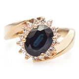 14K Yellow Gold 1.36 Ct. Oval Sapphire and Diamond Bypass Halo Ring