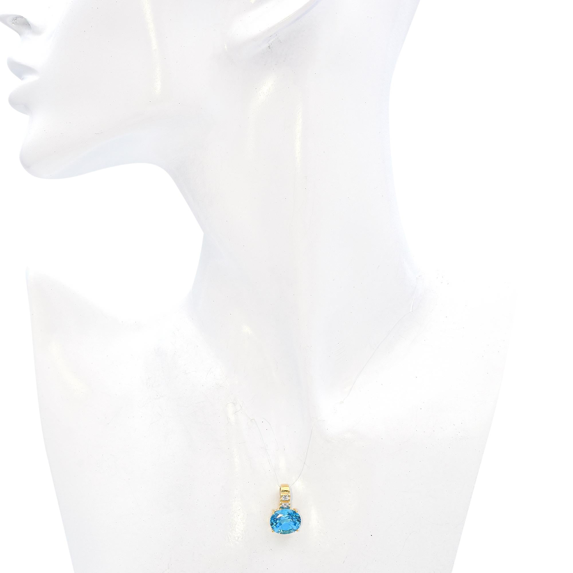 14K Yellow Gold 4.39 Ct. Blue Topaz and Diamond Pendant