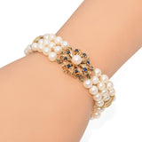 Vintage Three Strand Pearl Bracelet with 14k Yellow Gold Sapphire Clasp