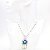 Amy Wesley Sterling Silver Zuni Opal, Turquoise, Lapis Sunface Pendant Necklace