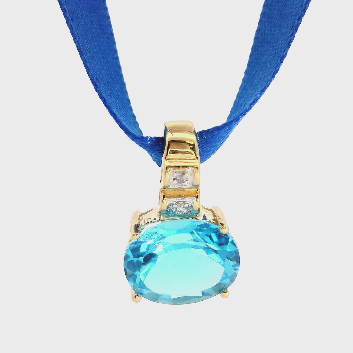 14K Yellow Gold 4.39 Ct. Blue Topaz and Diamond Pendant