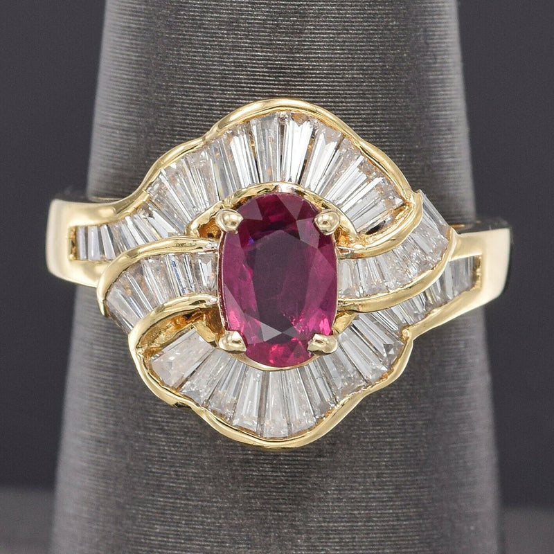 A 3 ct ruby ring flanked by two tapered baguette diamonds. - GIA 4Cs